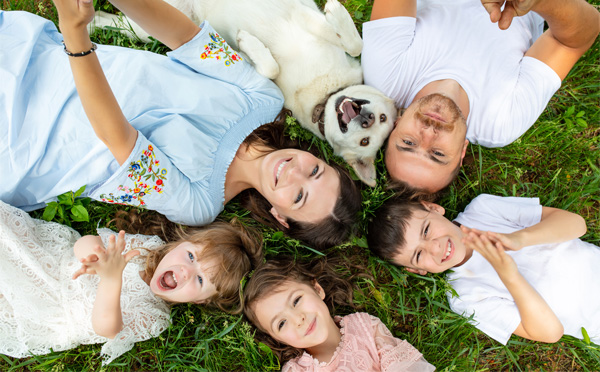 Young family with kids and dog